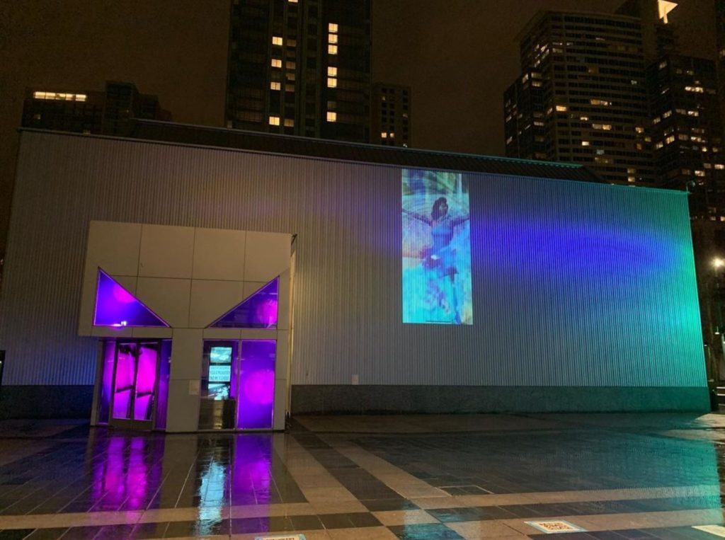 Sin Sol projected on the outside of the Yerba Buena Center for the Arts in San Francisco
